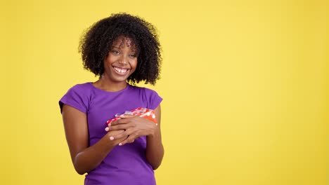 joyful woman receives and cherishes a gift