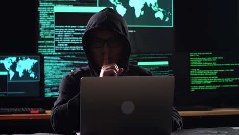 hacker in a dark room