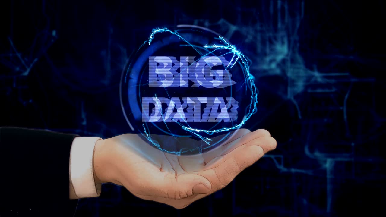 Painted hand shows concept hologram Big Data on his hand