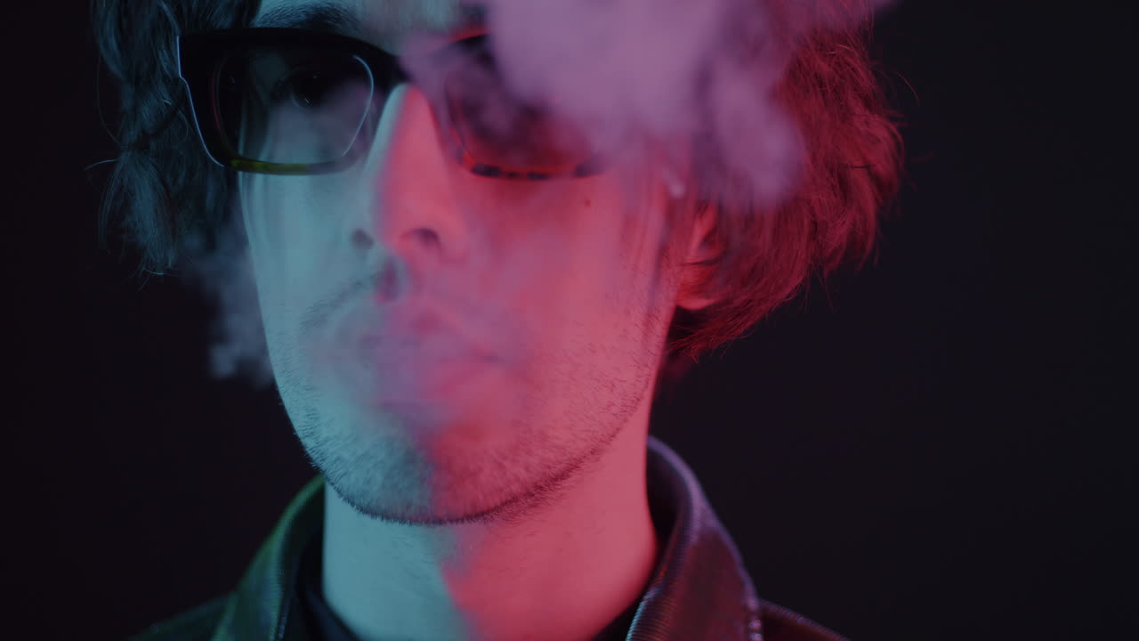 Stylish Man in Neon Lighting