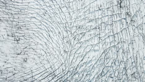 birds eye view aerial of many crevasses in icelandic glaciers in skaftafell park