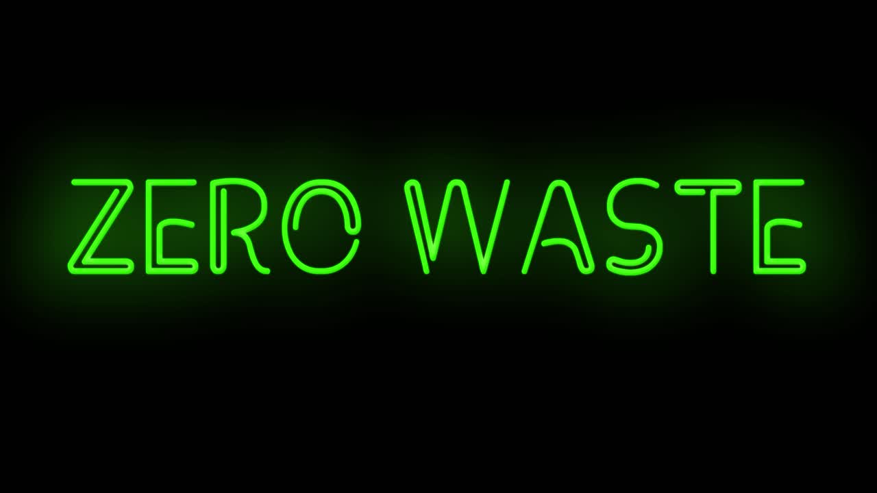 Blinkende ZERO WASTE elektrisk grønt neonskilt, der blinker med flimmer