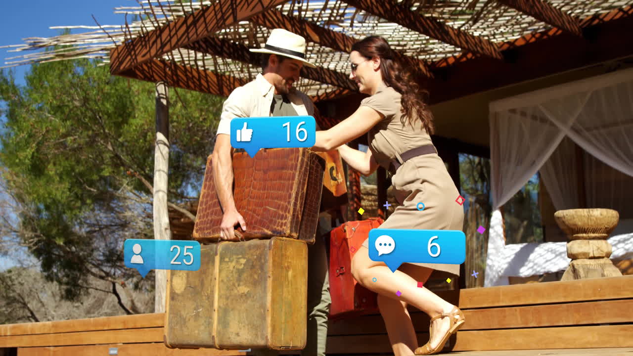Carrying luggage, couple surrounded by animation of social media icons in background