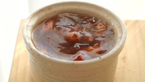 traditional chinese sweet soup with red dates and almonds