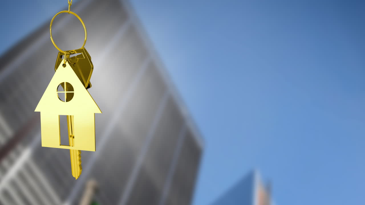 animación de la llave dorada y la casa sobre el edificio moderno borroso