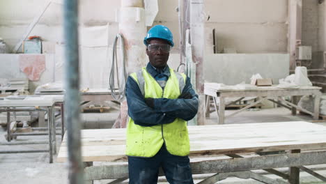 man wearing protective gear in factory