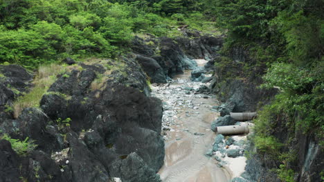 flowing shallow stream of charcos de nizao, los cacao, san cristobal in dominican republic