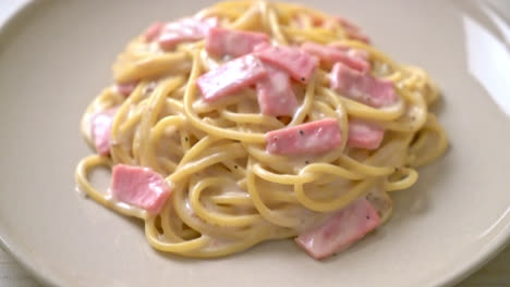 homemade spaghetti white cream sauce with ham - italian food style