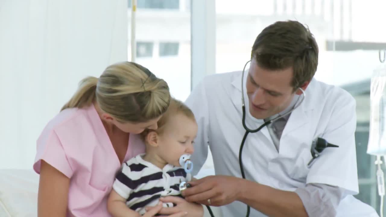 Doctor and Nurse with a Baby