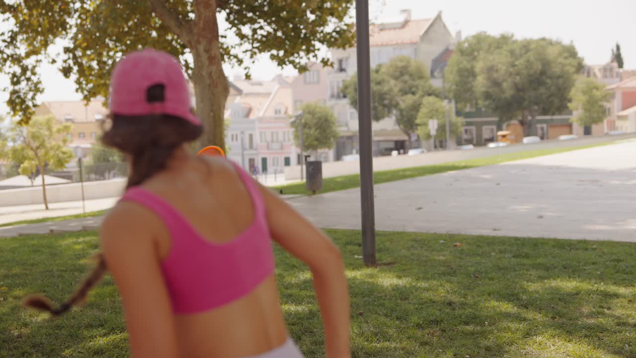 Women playing racket in the park