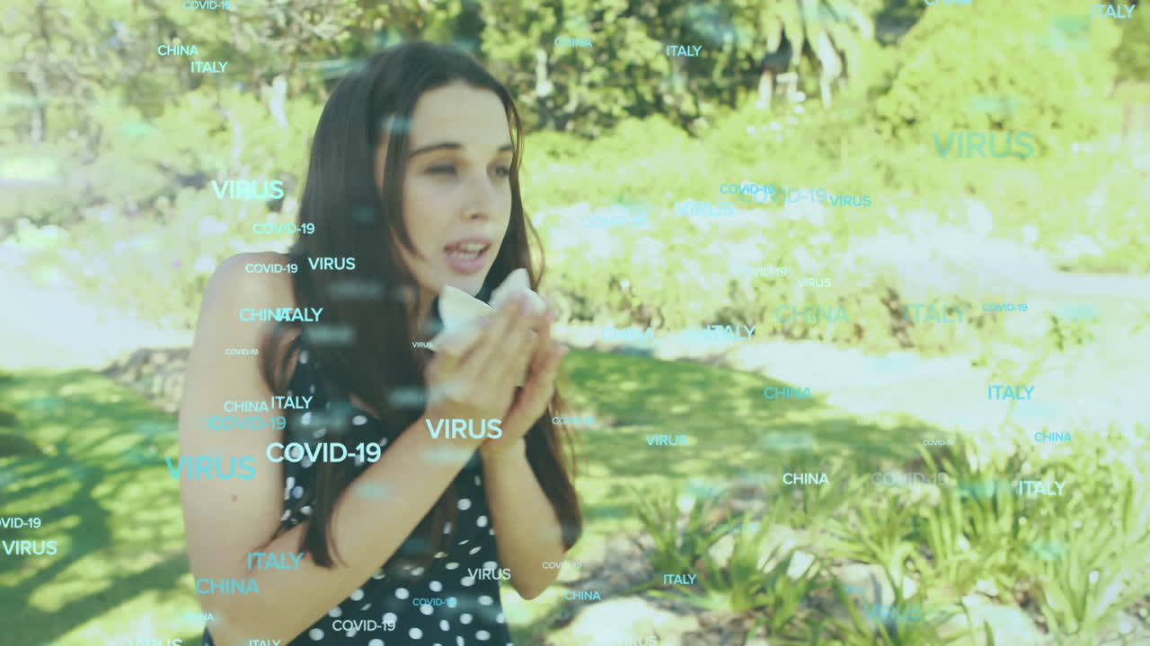 animación de palabras virus y nombres de países flotando sobre mujer caucásica estornudando en un pañuelo