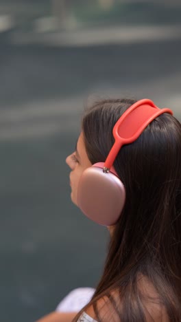 woman listening to music with headphones