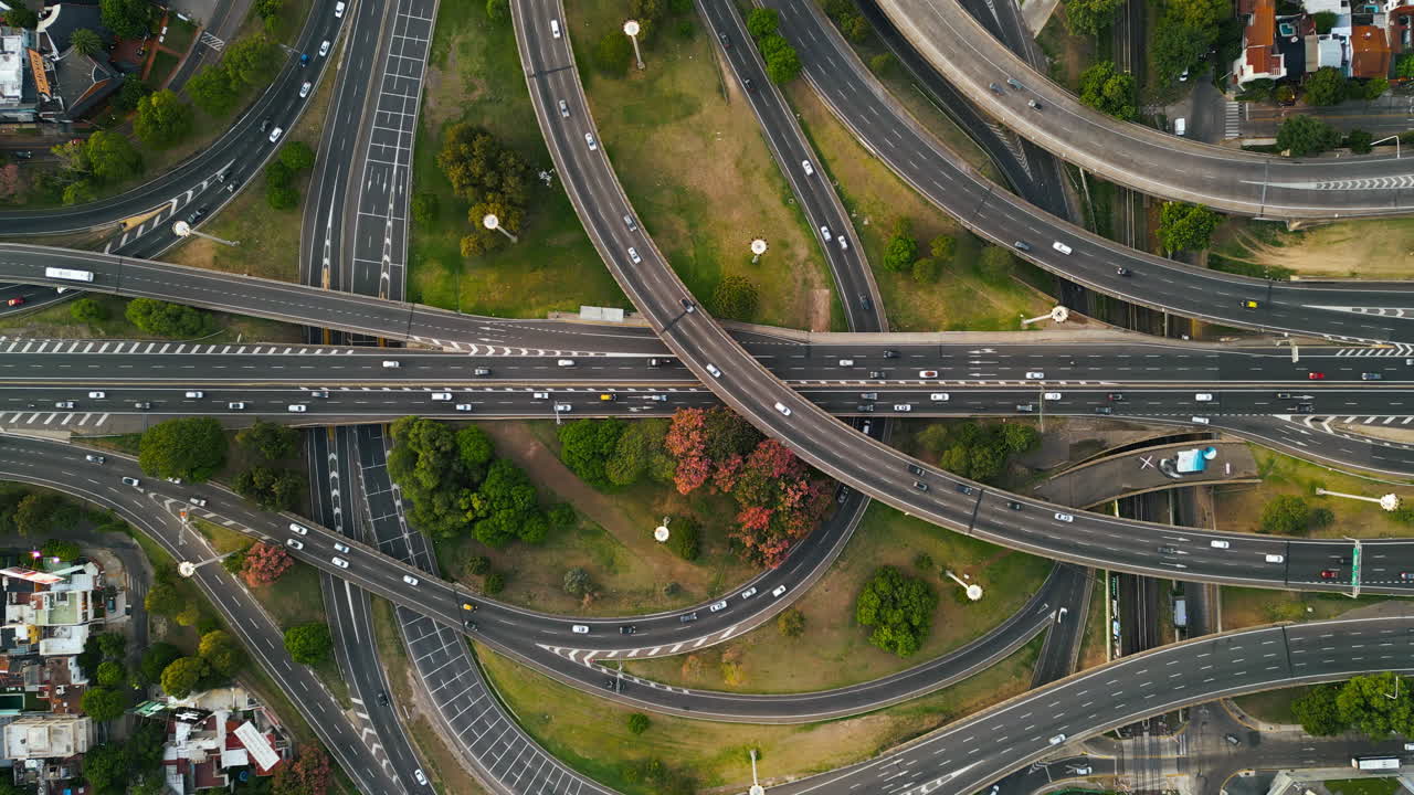 Aerial Time Lapse of Busy Highway Interchange with Moving Traffic