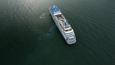 Cruise-ship-calmly-floating-over-deep-ocean-water