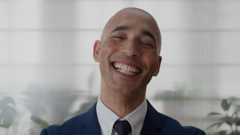 portrait-successful-hispanic-businessman-manager-laughing-enjoying-career-success-cheerful-young-professional-entrepreneur-wearing-suit-slow-motion-corporate-leadership