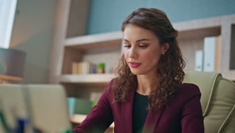 office girl working laptop doing research closeup. frustrated manager browsing