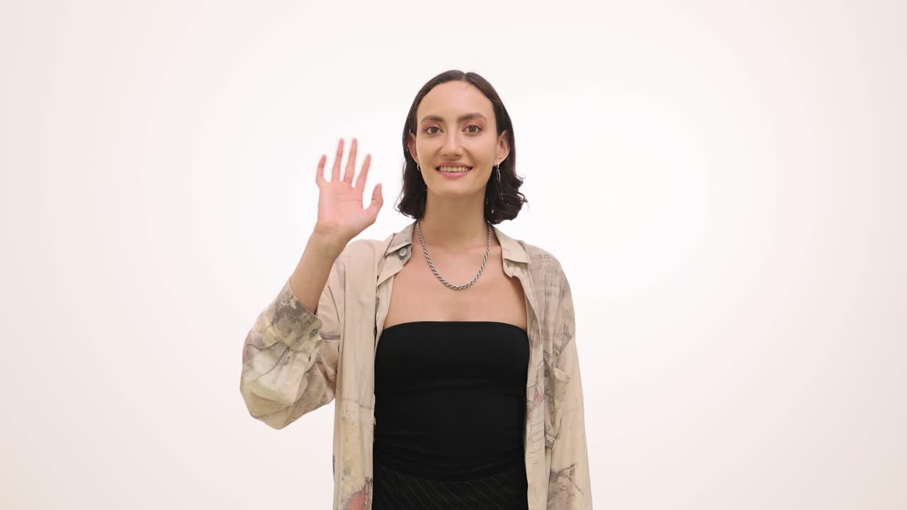 Young Woman Smiling and Waving