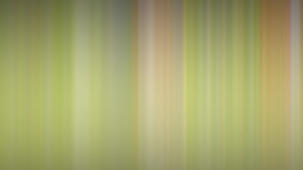 Abstraktní rozmazané barevné pozadí se svislými čarami měnícími tvar a barvu. Texturované pozadí.
