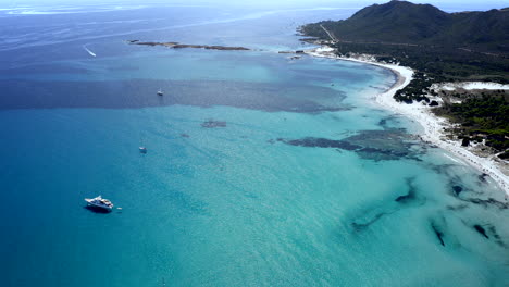 aerial drone view over la cinta beach, san teodoro, emerald coast, sardinia, italy