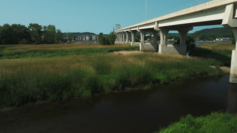 Aerial-flying-forward-reveal-Wabasha-truss-bridge-crossing-Mississippi-River