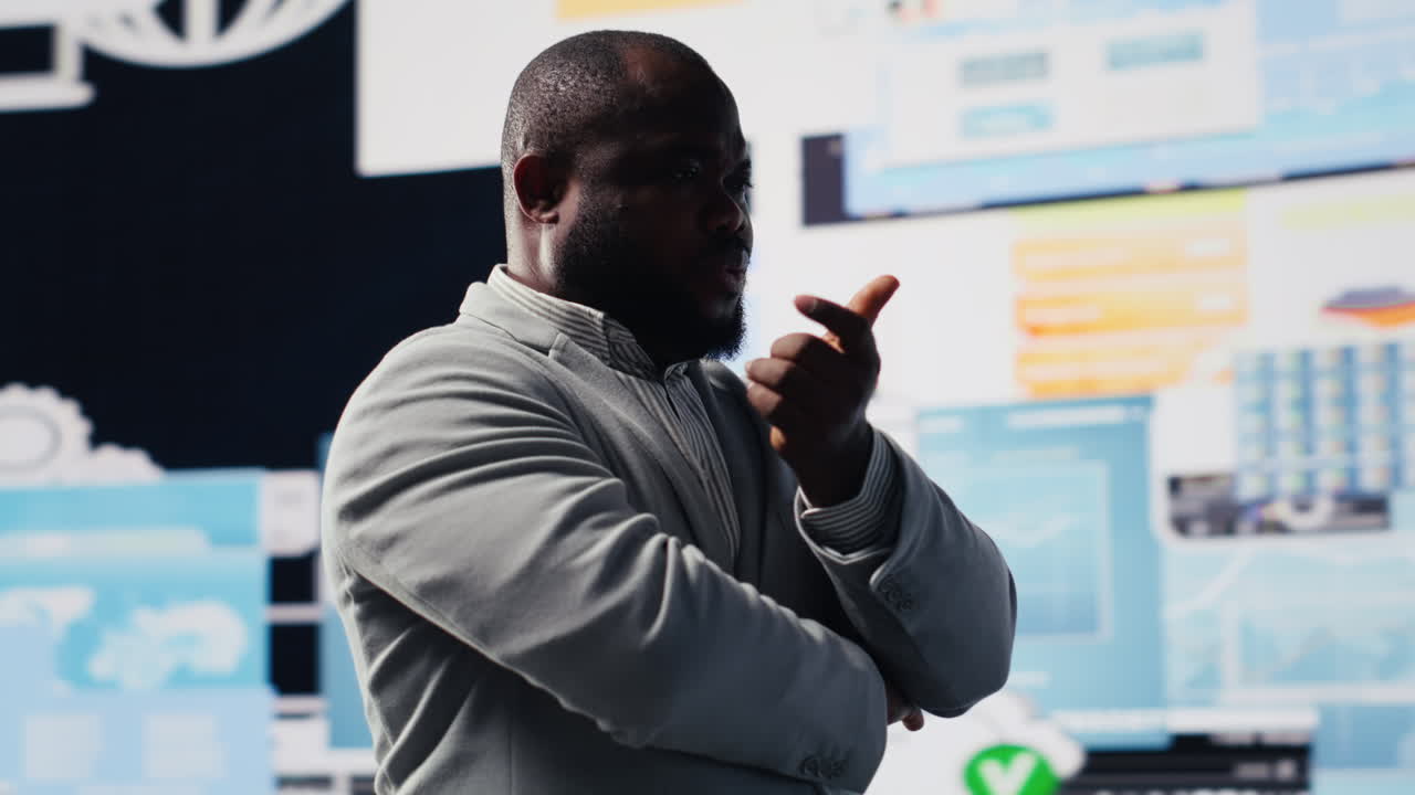 African american guy reflecting on annual financial reports for new development