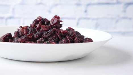 dried cranberries in a white bowl