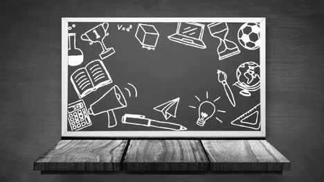 múltiples iconos de concepto escolar en la pizarra negra