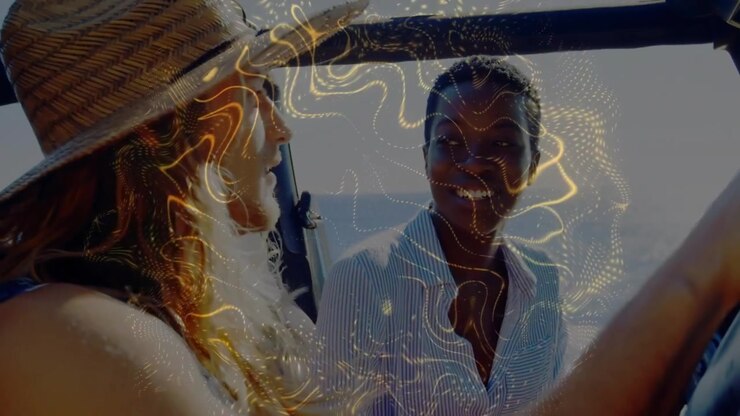 Smiling woman straw hat shades, man striped shirt exchanging smiles in coastal jeep, golden overlay