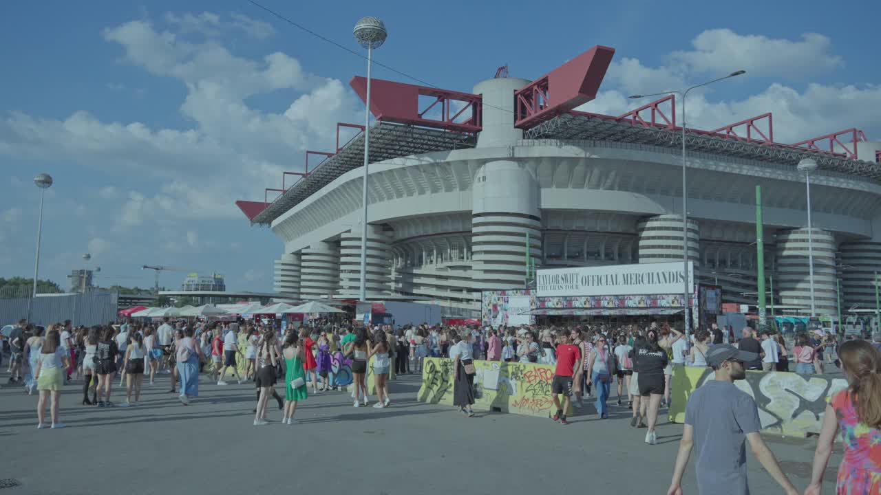 Fans gather outside a stadium for Taylor Swift's The Eras Tour concert