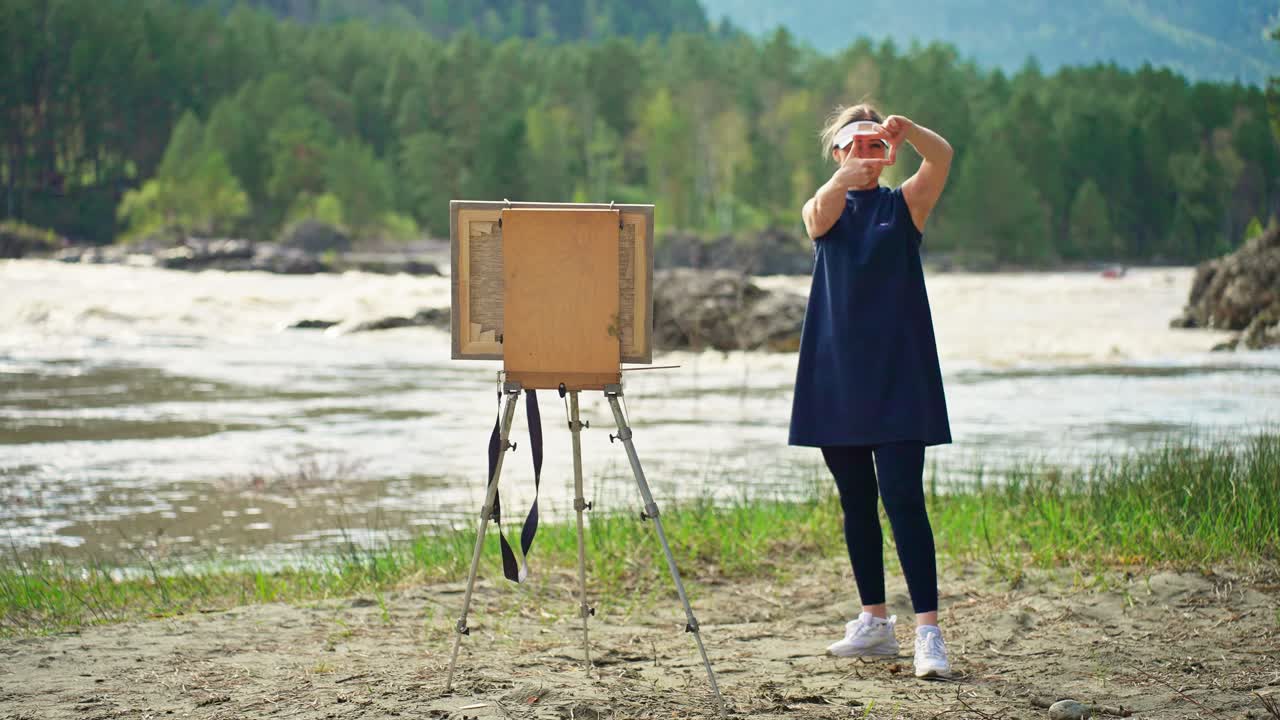 Artist painting a landscape outdoors