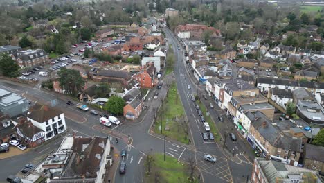 Pull-back-drone-aerial-reveal-Esher-high-street-Surrey-Uk