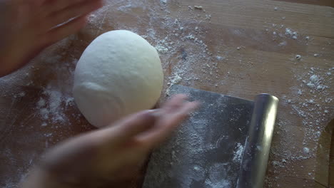 chef preparing dough for pizza, croissants or bread