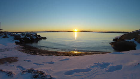 4k-Wide-shot-of-a-beautiful-sunset-on-a-winter-day-in-Sweden