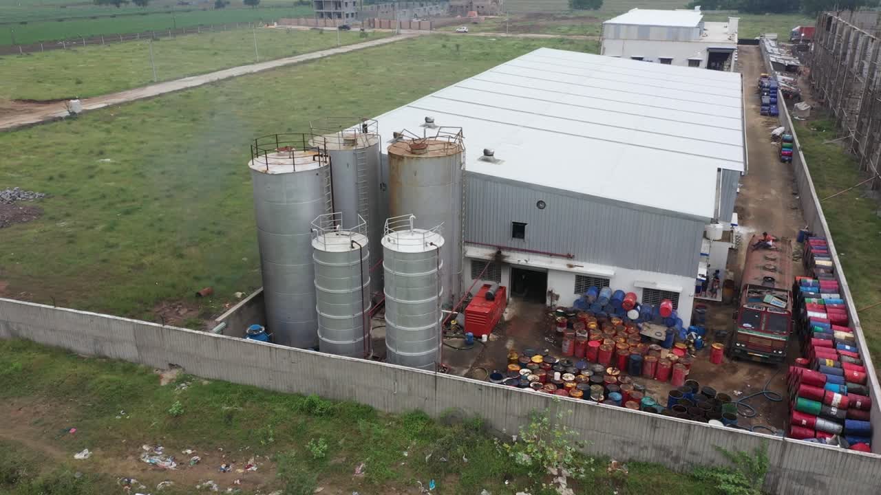 aerial drone view grease storage many tank, industry 5.0