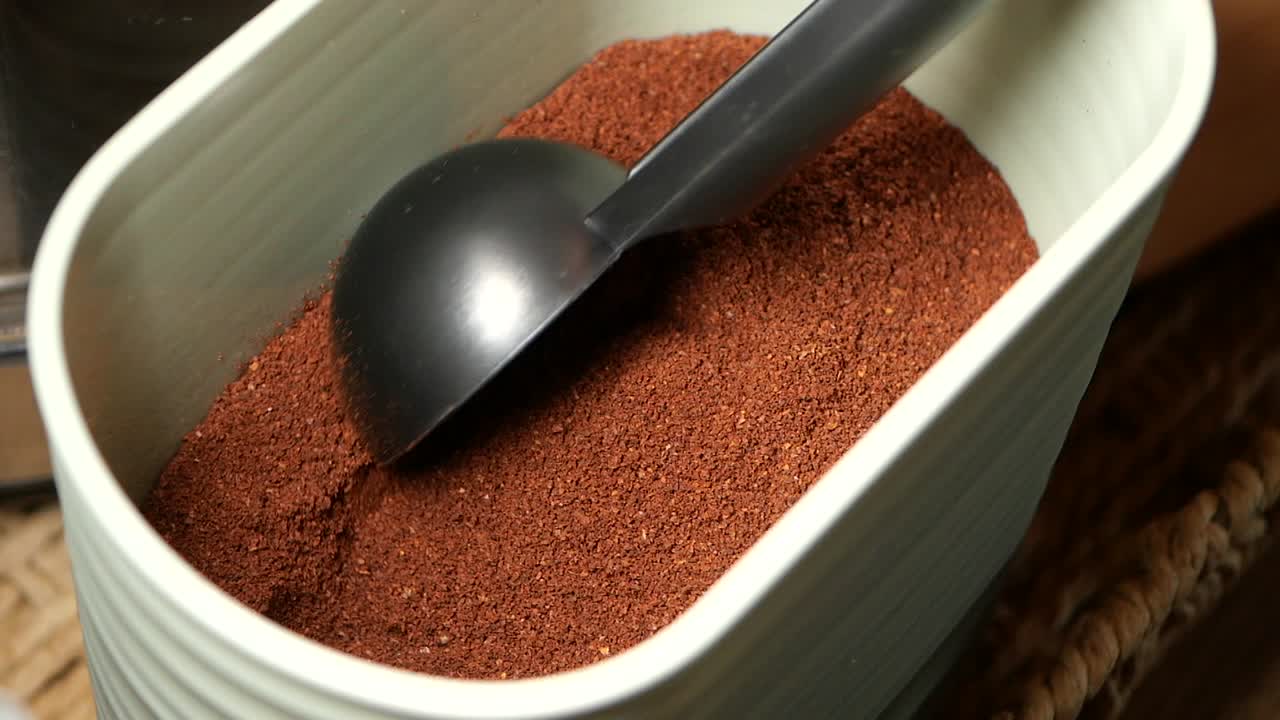 Ground Coffee in Container with Scoop