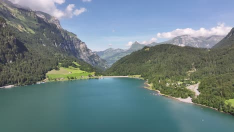 aerial - klöntalersee, a swiss mountain lake in kanton glarus, switzerland