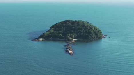 A-bird's-eye-view-captures-the-enchanting-Isle-of-the-French,-nestled-between-the-beaches-of-Jurere-and-Canavieiras-in-Florianopolis,-Santa-Catarina,-Brazil