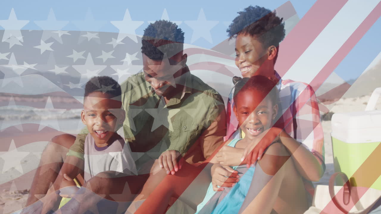 animación de la bandera de los estados unidos sobre una feliz familia afroamericana