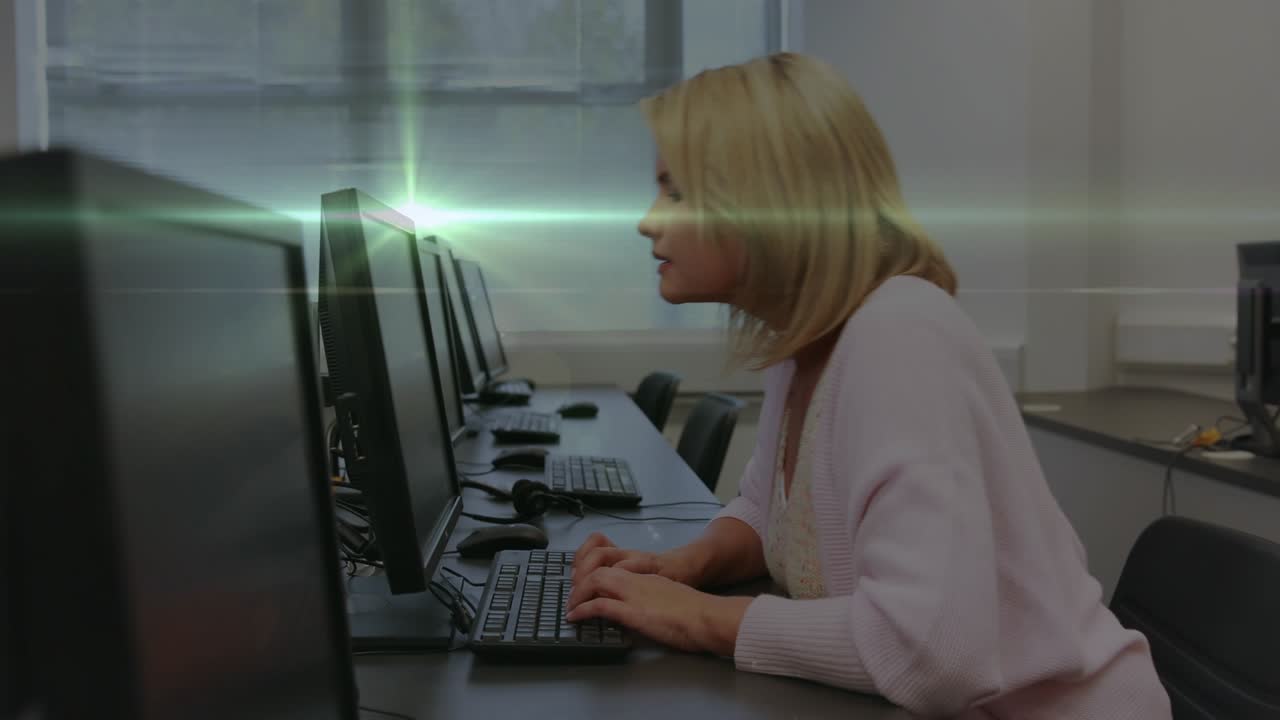 Animation of light spots over caucasian female teacher using computer