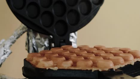 making waffles in a waffle toaster