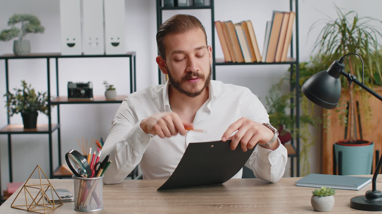 Businessman working on laptop at office talk on online communication video call with employee boss