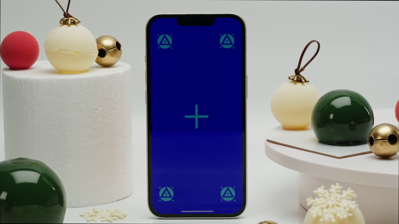 Smartphone Display with Christmas Ornaments
