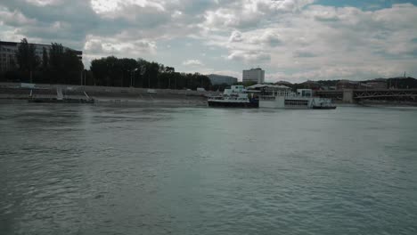 Boat-ride-through-Danube,-summer-afternoon-and-sun-set,-A38-ship