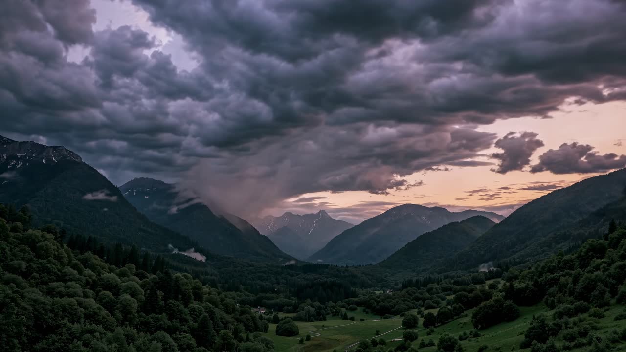 Dramatic landscape video with a wide-angle view of a stormy sky over lush mountains at dusk