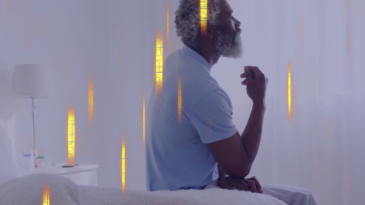 Animation of data processing over biracial man on bed