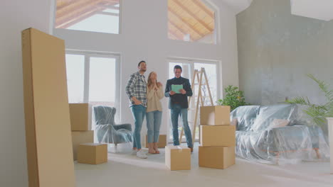 couple visiting a house for purchasing