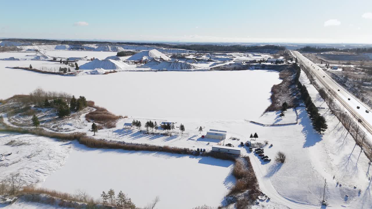 A snowy landscape view of James Dick Quarry in Caledon Village, Ontario, Canada