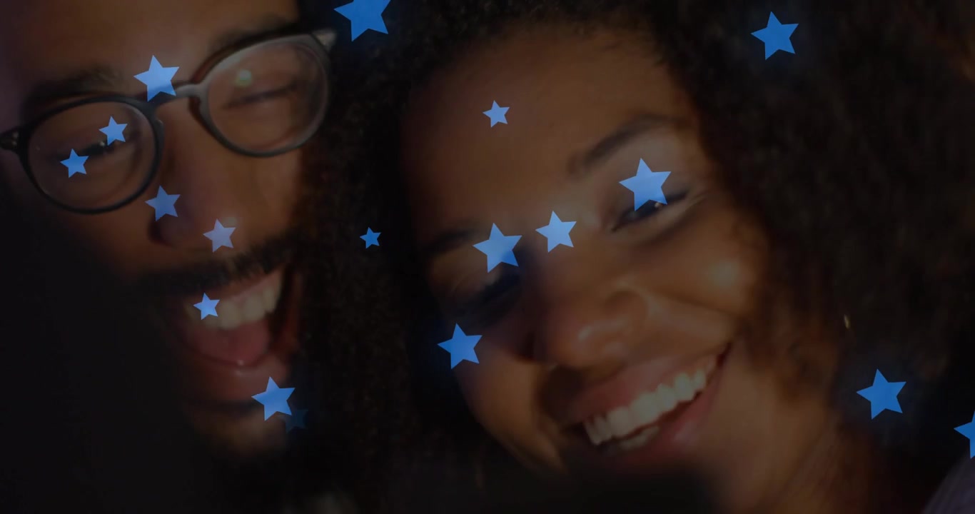 Happy Couple Laughing Together with Blue Stars Overlay