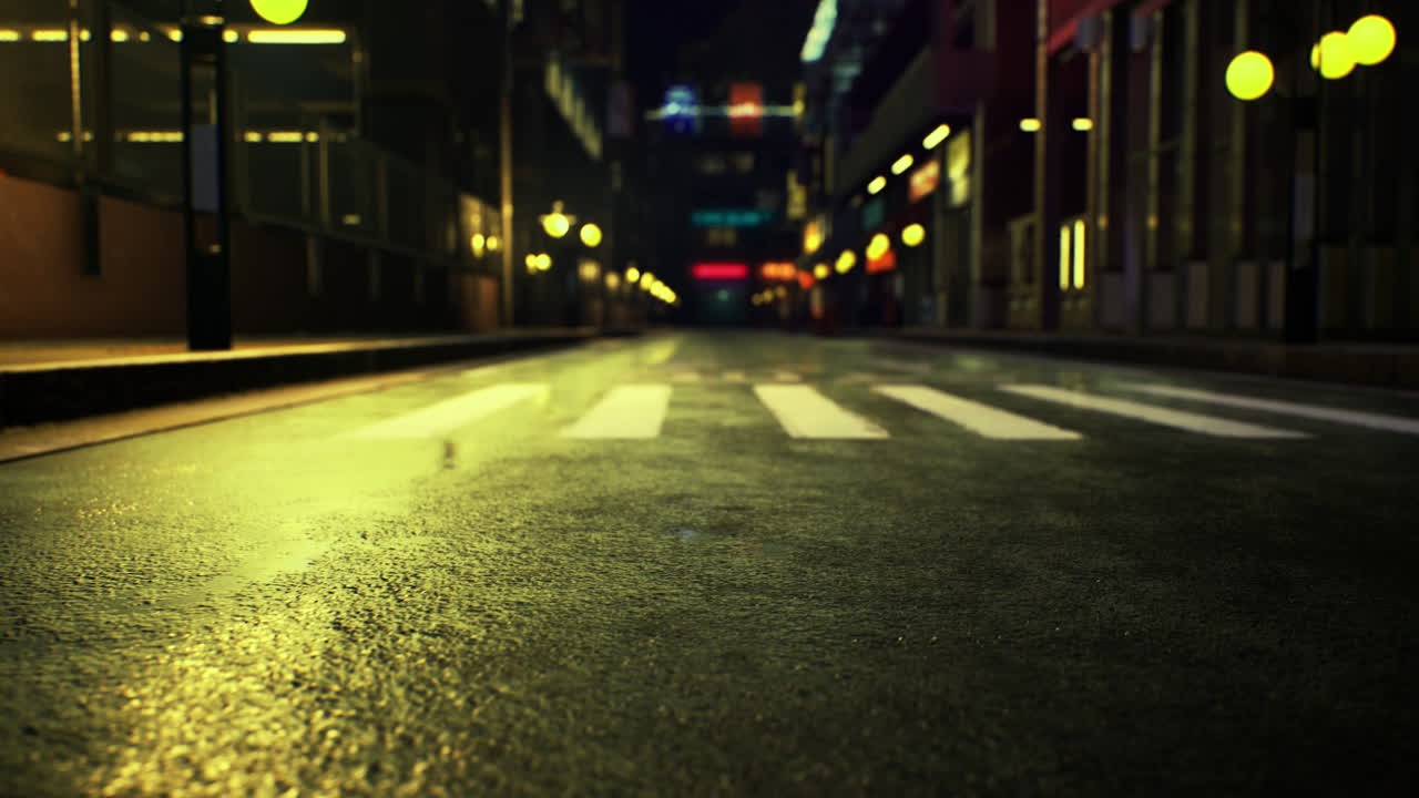 Nighttime city street with lustrous reflections and glowing streetlights