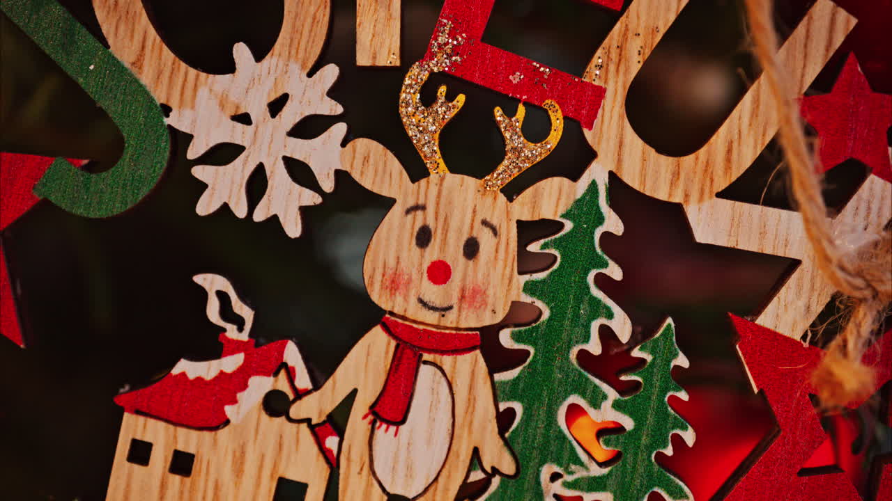 Close up of Christmas decorations and snow on a tree